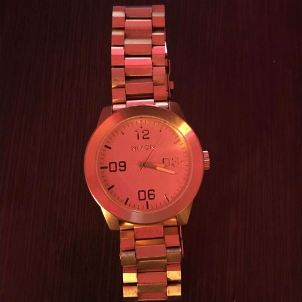 Gold Nixon watch